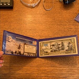 Mount Rushmore National Memorial colorized $2 bill set in protective plastic
